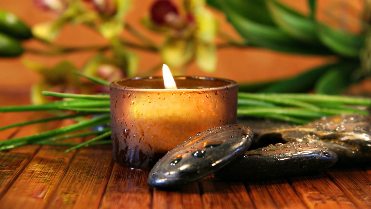 Person programming on a laptop on a building