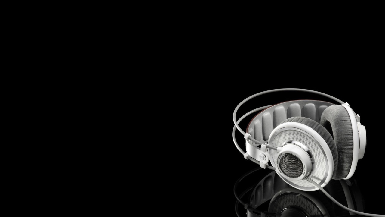 Headphones on a yellow backdrop